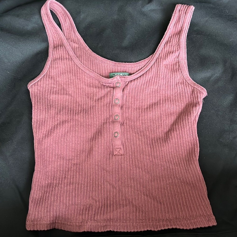 This tank top is perfect for any occasion, it is very comfortable & stylish